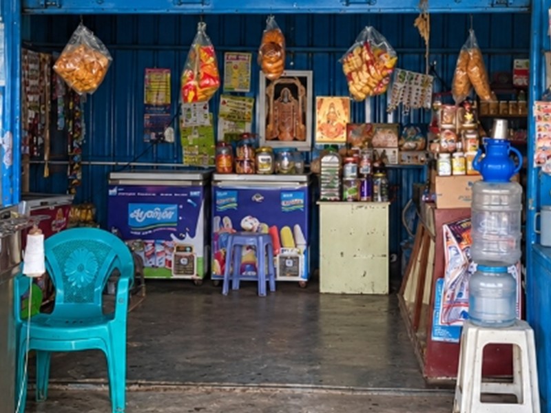 Commercial Aavin ice cream chest freezers inside the Naidumangalam dairy store.
